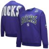 Mitchell & Ness Milwaukee Bucks Purple Hardwood Classics There Gorgeous & Back 2.0 Vintage Pullover Sweatshirt High - demand item! Order this sought - after jersey immediately.