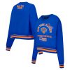 Pro Standard New York Knicks Women's Admirable Blue Area Code Cropped Pullover Sweatshirt Show your dedication! Own this special jersey for your team.